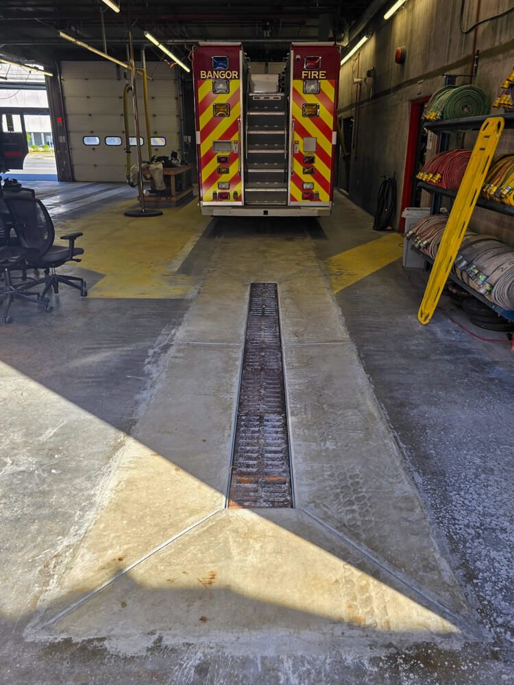 photo of Hines concrete contractors finished drain in Bangor Fire Station floor